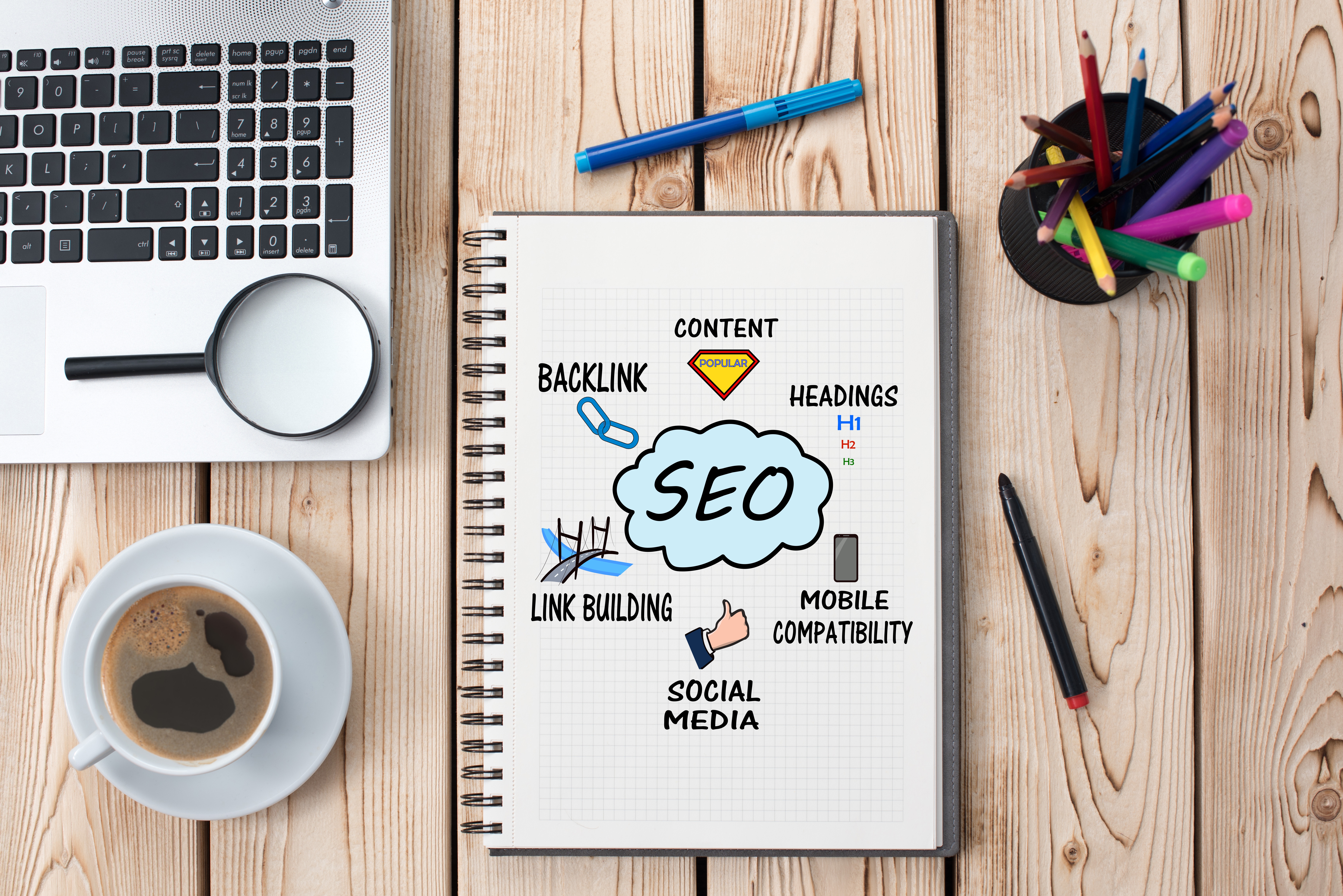 A notebook on a table describing Horiseon's search engine optimization tasks